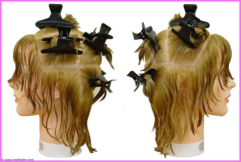 Seccionar el cabello largo con pinzas para secarlo