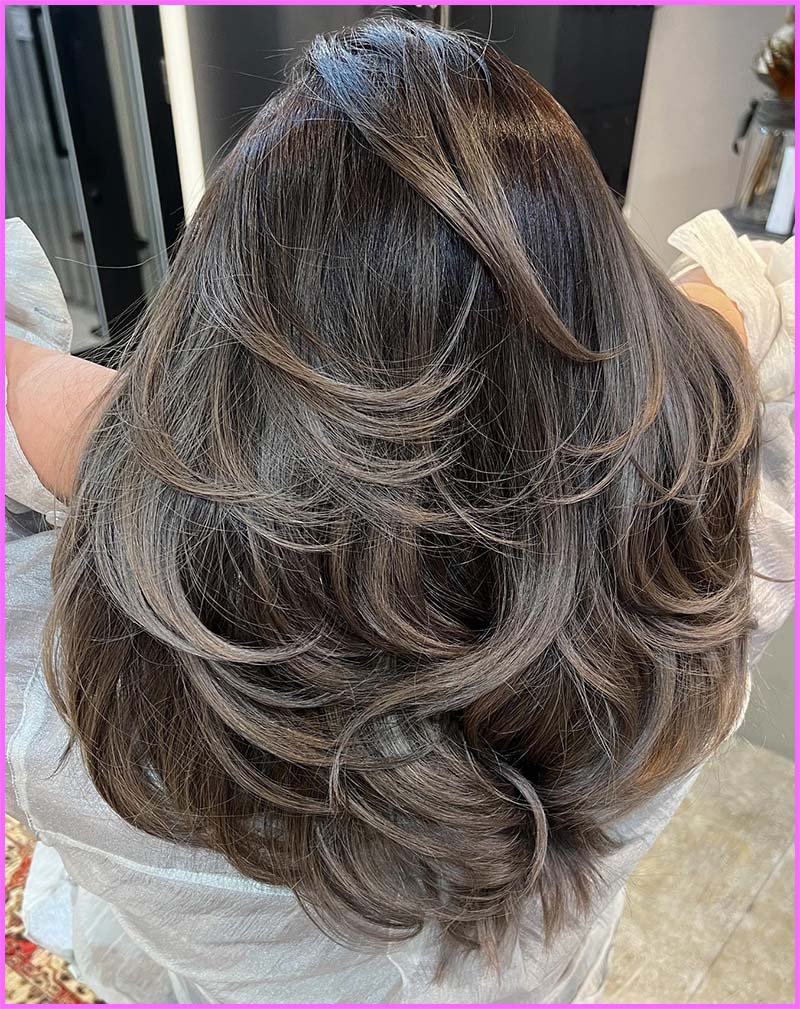 corte de mariposa para cabello largo